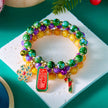 Jilgteok Christmas Bracelet T Santa Claus Snowflake Christmas Tree Beaded Stretch Bracelet Multicolor Jingle Bell Reindeer Charm Bracelets for Women Girls Kids Xmas Holiday Costume Jewelry(3Pcs)