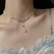 Minimalist Pearl Bow Necklace