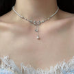Minimalist Pearl Bow Necklace